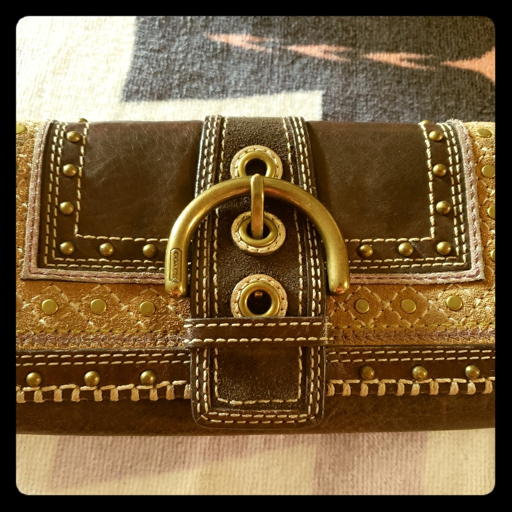 COCoach wallet in leather and bronze
